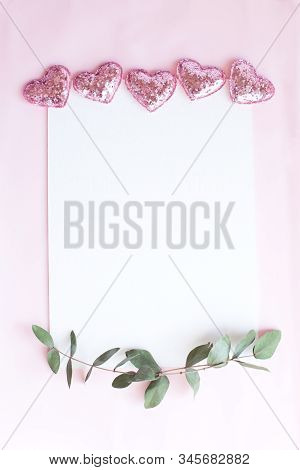 Background With Copy Space Blank On Pink Background With Pink Glittered Hearts, Eucalyptus Branch. W