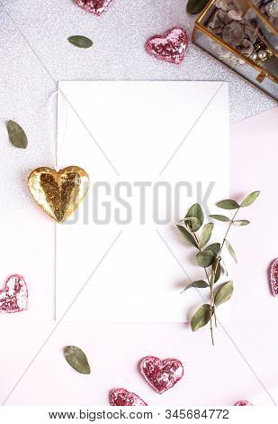 Background With Copy Space Blank On White Table With Glitter Heart, Eucalyptus Branch, Flowers And L