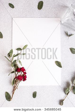 Background With Copy Space Blank On White Table With Glitter Heart, Eucalyptus Branch, Flowers And L