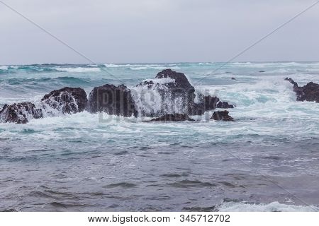 Beautiful Nature Sea Landscape Scene With Black Stone Of Jeju Island, South Korea