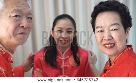 Chinese Family Happy Together In Chinese New Year Gathering Event