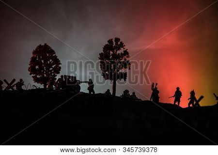 War Concept. Military Silhouettes Fighting Scene On War Fog Sky Background, World War German Tanks S