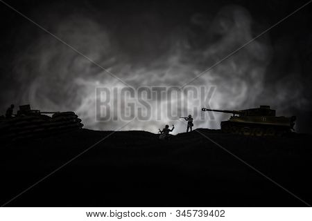 War Concept. Military Silhouettes Fighting Scene On War Fog Sky Background, World War German Tanks S
