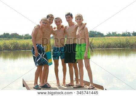 Krasnodar Russian Federation-23.08.1014: A Group Of 5 Teenage Friends, Aged 14 Years. With Happy, Sm
