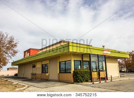 Abandoned One Level Restaurant Building With Drive Thru Window