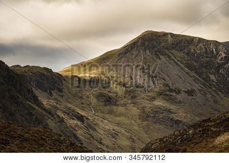 Majestic Autumn Fall Landscape Image Of Mountain Peaks In Lake District Near Buttermere With Gorgeou