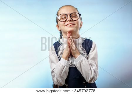 Cute Schoolgirl In Glasses Smile Implore Gesture