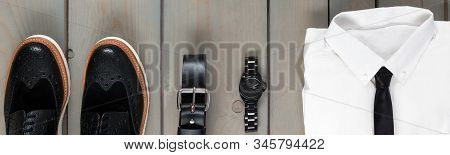 Banner Of Businessman, Work Outfit On Grey Wooden Background.