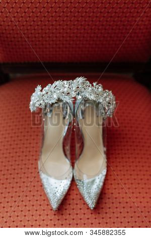 Bridal Shoes Decorated Jewerly Wreath Flat Lay Closeup Photography. Glossy Classical Woman Stylish S