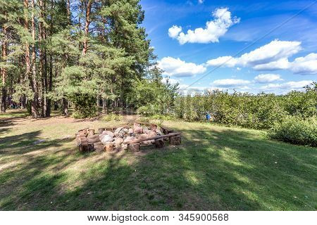Wooden Camping Arbors  With All Conviniences In A Pine Forest