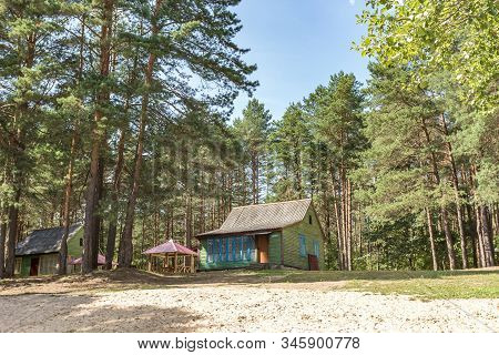 Wooden Camping Arbors  With All Conviniences In A Pine Forest