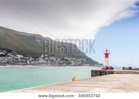 Kalk Bay, Western Cape Province, South Africa - December 30 2019: Recreational Pier With Beacon Buil