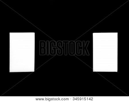 Two White Rectangles On A Black Background