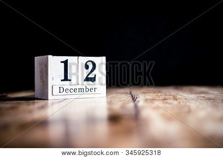 December 12th, 12 December, Twelth Of December - White Block Calendar On Vintage Table - Date On Dar