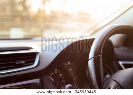 Car Dashboard Interior View Of Inside The Vehicle Including Steering Wheel Dials And Controls