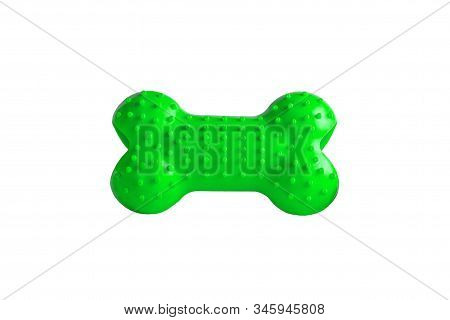 Green Rubber Dog's Bone Isolated On White Background, Puppy Dog Toy Imitated Bones For Relax With Ch