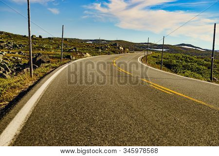 Road Crossing Hardangervidda Plateau, Norway Landscape. National Tourist Hardangervidda Route.