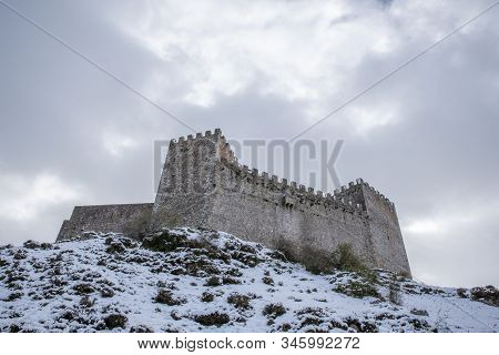 Medieval San Vicente Castle In A Winter Landscape With Snow