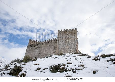 Medieval San Vicente Castle In A Winter Landscape With Snow
