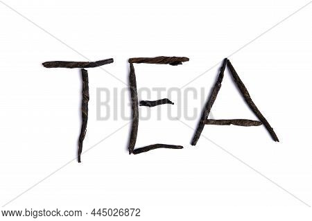 The Inscription Tea Is Made Of Twisted Ku-din Leaves. Light Background. Close-up. Top View. Selectiv