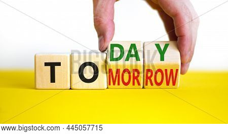 Do It Today Not Tomorrow. Businessman Turns Wooden Cubes And Changes The Word 'tomorrow' To 'today'.