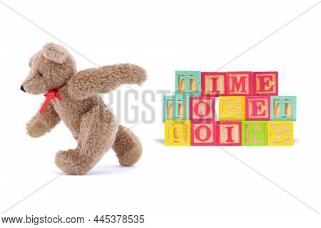 Time To Get Going Business Concept With Wood Blocks And Teddy Bear