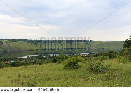 Landscape On The Banks Of A Large River With Calm Smooth Water. Bakota Bay View On The Dniester Rive