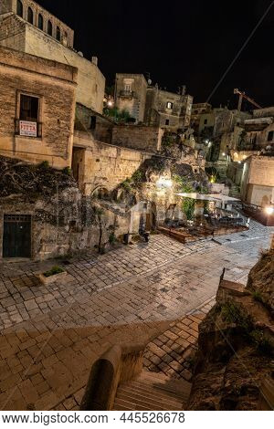 Matera, Italy - September 19, 2019: Evening View Of The City Of Matera, Italy, With The Colorful Lig