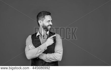 Look At This. Happy Man Point Index Finger Red Background. Objective Pointing. Hand Gesture. Marketi