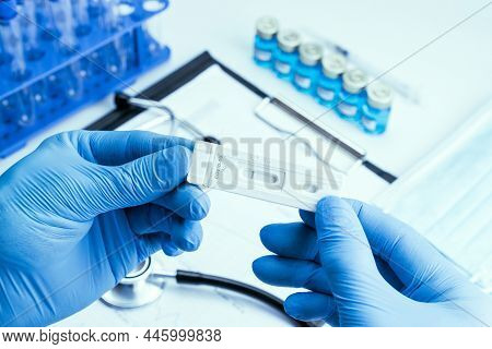 Coronavirus Test Antigen Covid Kit. Doctor Holding Rapid Covid Medical Test. Laboratory Hospital Lab
