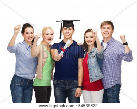 education and people concept - group of standing smiling students with diploma and corner-cap