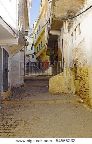 Old street in Moulay Idriss in  Morocco. It is holy town for the Moroccan people. It was here that Moulay Idriss I arrived in 789, bringing with him the religion of Islam and starting new dynasty.