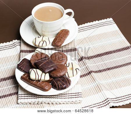 cup of coffee with chocolete biscuits