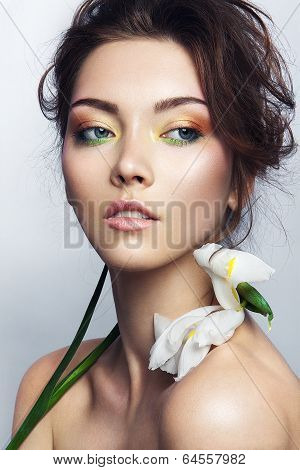 Close-up studio portrait of beautiful woman
