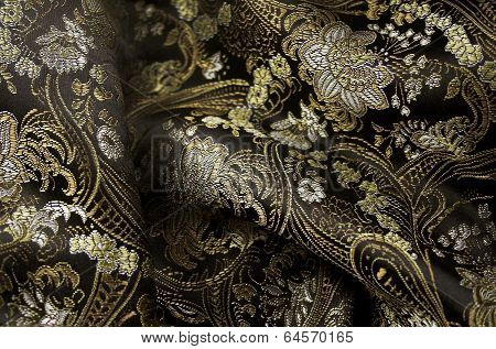 Silk black and gold fabrick