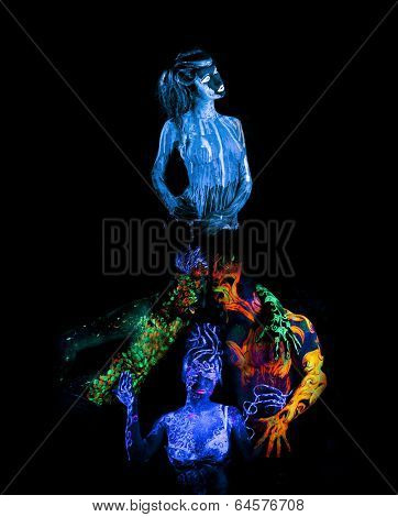 Body art glowing in ultraviolet light