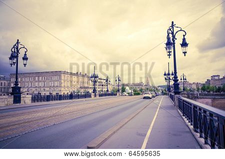 Old stony bridge in Bordeaux, France Europe