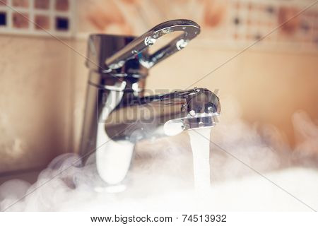 water tap with hot water steam