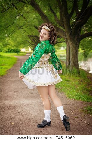 Young Woman In Irish Dance Dress Posing Outdoor