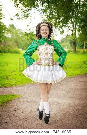 Young Woman In Irish Dance Dress Posing Outdoor