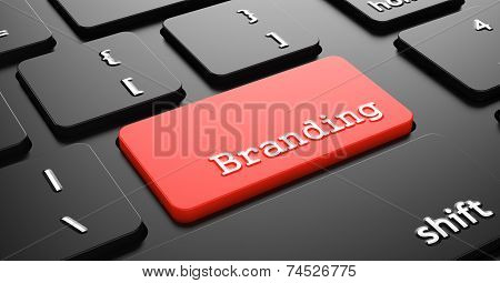 Branding on Red Keyboard Button.