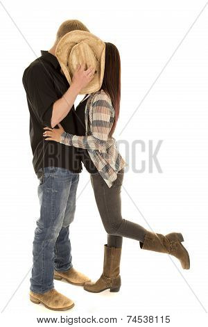 Couple Kiss Behind Hat Leg Up