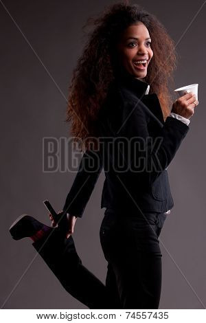 Beautiful Afroamerican Girl With Coffee In A Strange Pose