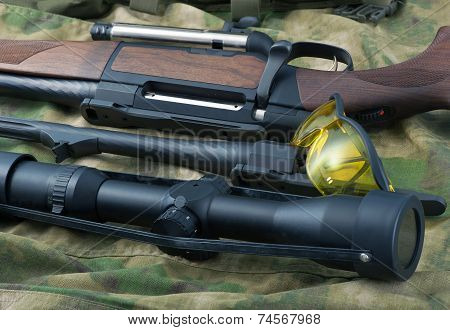 Different types of rifle guns on colorful background