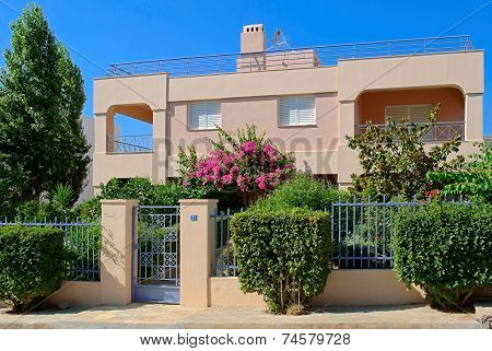 House with trees.