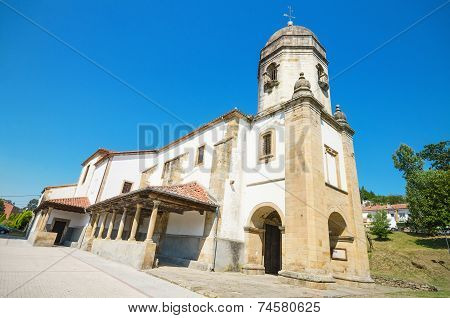 Scenic view of an ancient church in the touristic village of Lastres Asturias Spain.