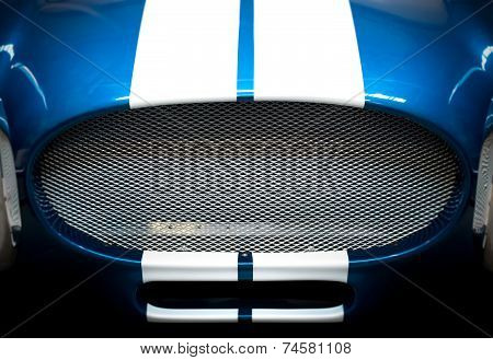 Detail Of Grille Of Blue And White Striped Car