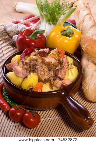 Pork stew with potatoes, pepper and other vegetables