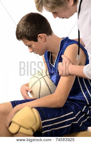 doctor giving first aid the hurt sportsman