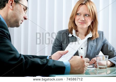 Young woman having a job interview in a office